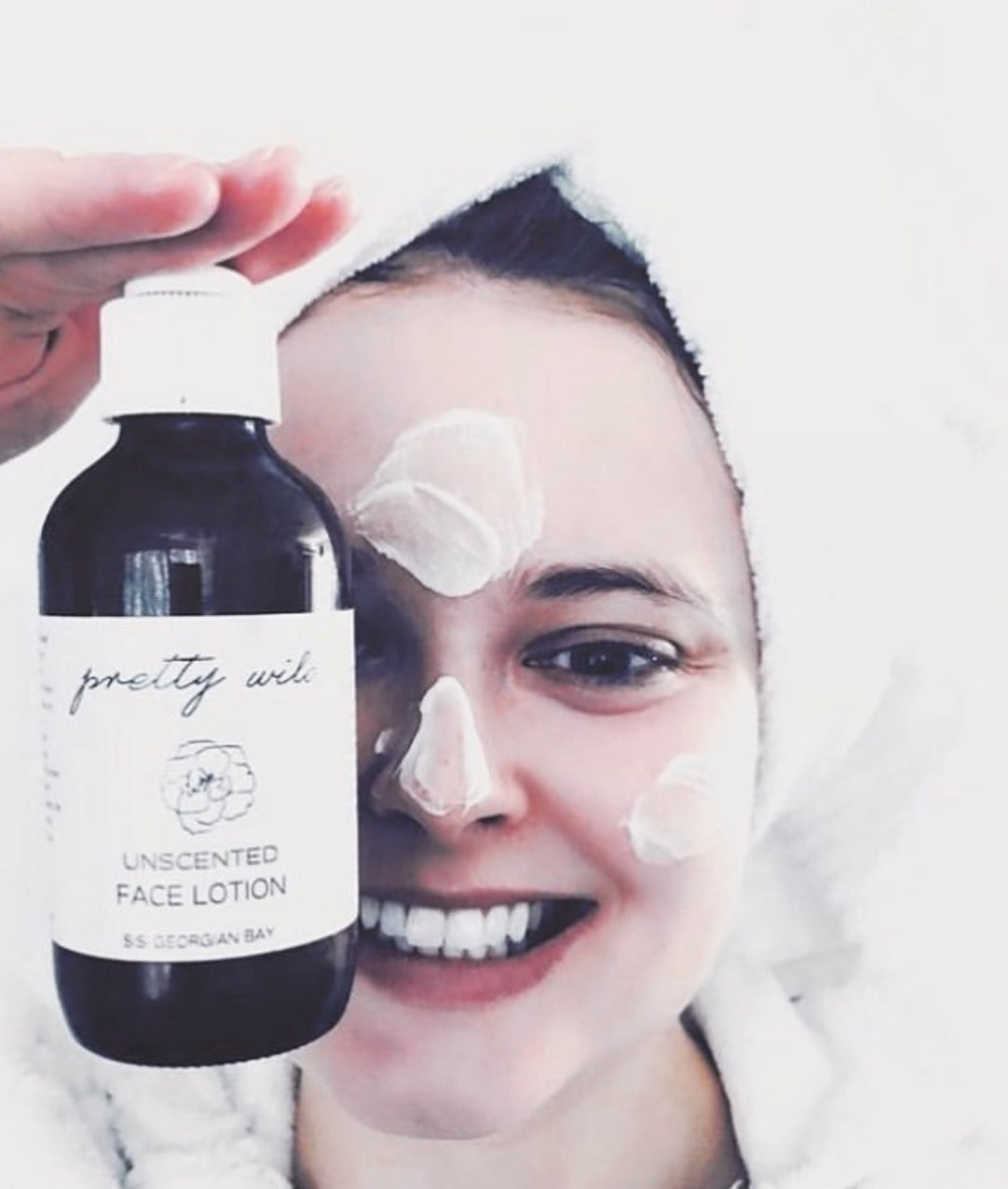 SiSi Georgian Bay pretty wild unscented face lotion in amber glass jar with pump lid