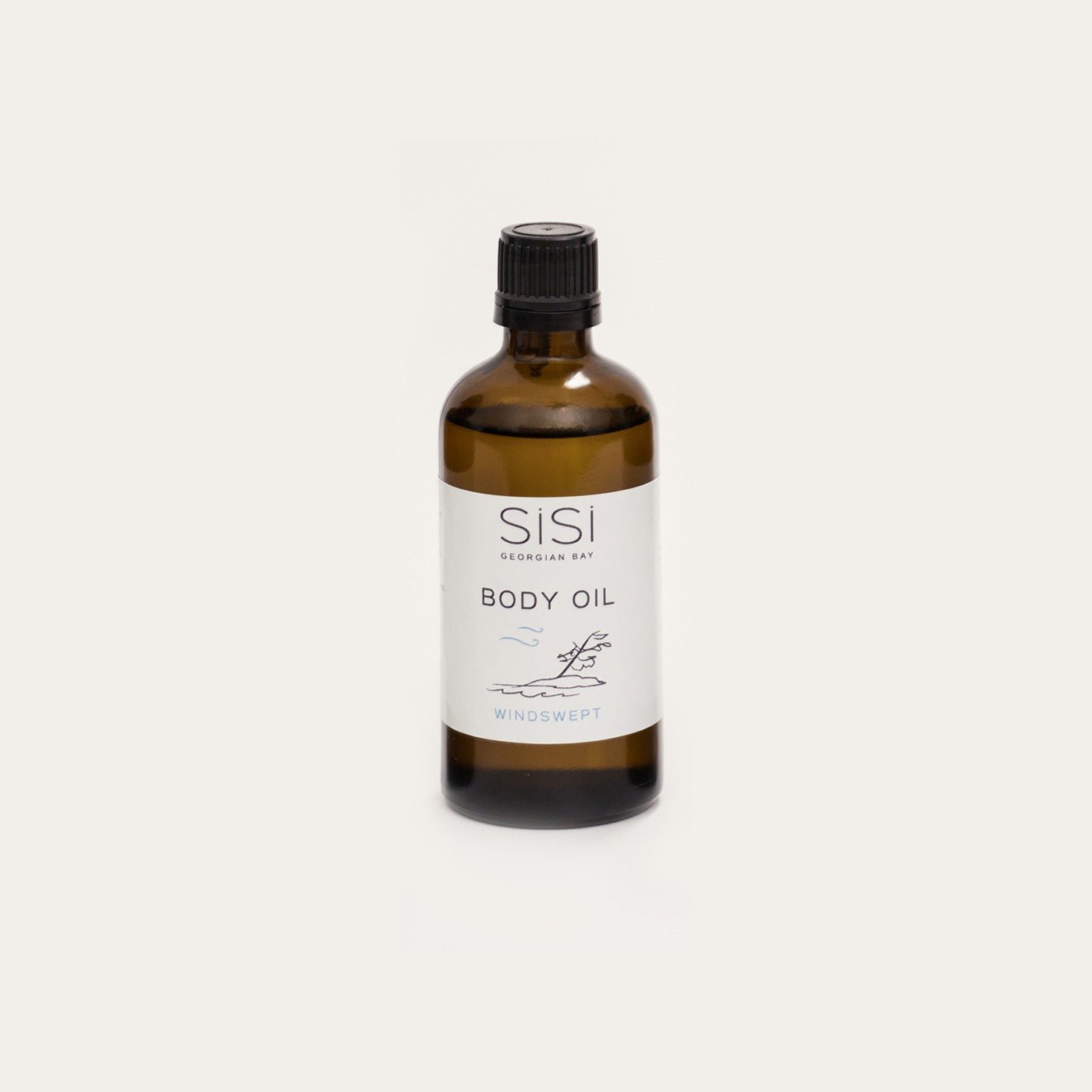 Windswept body oil in a 4oz amber glass bottle on a creamy white background