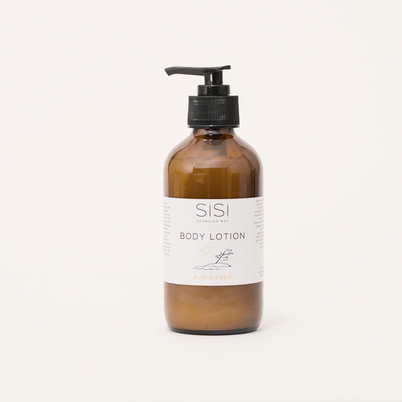 Sunkissed Body Lotion in an 8oz bottle and pump top lid with our gorgeous hand drawn label