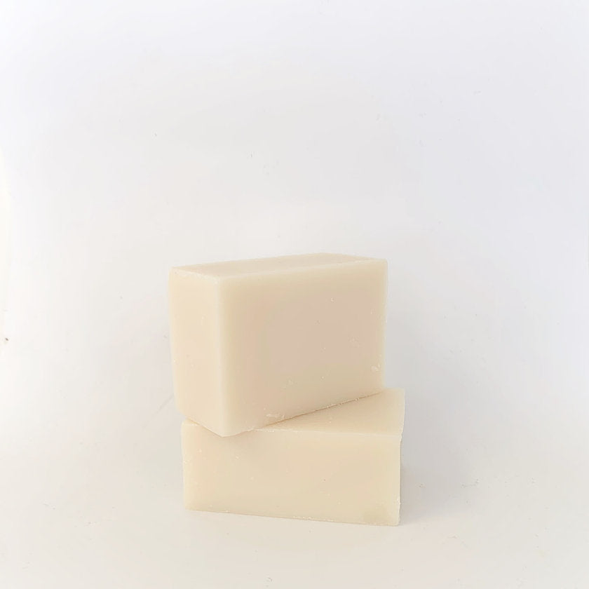 Natural skincare products - Natural Shampoo Bar - SiSi Georgian Bay two bars of soap on a creamy white background